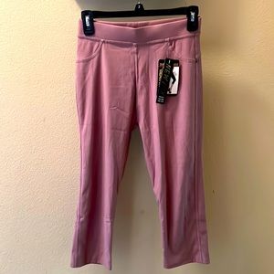 Brand new capri pants never worn. Tags still in tact. Beautiful Rose Pink color.